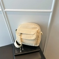 Minimalist cream corduroy crossbody bag with soft textured flap and fabric shoulder strap - White
