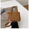 Caramel woven crossbody bag with leather strap and trapezoid structure in retro style - Brown