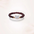 Detail of beaded ring with deep red stones and a white cat-shaped natural stone charm - J0404 Garnet Ring