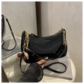 Black patent leather crescent underarm bag with gold chain and cherry charm detail - Black with Pendant