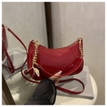 Red crescent shoulder bag in glossy patent leather with cherry charm and chain strap - Red with Pendant