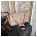 Detail of light brown crossbody bag featuring a golden round metal twist lock closure - Khaki