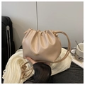 Detail of light apricot pleated cloud bag with gold FASHION & BAGS lettering and shoulder strap - No Pendant / Khaki