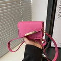 Mini rose red leather crossbody bag with golden buckle and sleek shoulder strap - Rose Pink