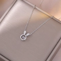 Collier lapin en argent avec pierre de zircon mobile sur un coffret à bijoux champagne - Collier Lapin Dansant (X3485) / Argenté