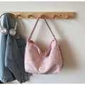 Pink quilted mummy tote bag with colorful wave embroidery hanging on a wooden rack - Large Capacity Wave Embroidery Shoulder Bag (Pink) / Pink