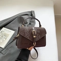Structured dark brown satchel bag with snakeskin texture and gold buckle detail - Brown