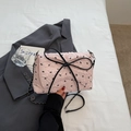 Pink seersucker baguette bag with black bow patterns and elegant chain strap - Pink
