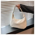 Macro detail of white woven texture on minimalist shoulder bag with smooth top zipper - White