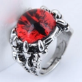 Macro shot of silver gothic ring featuring a red dragon eye held by four sharp eagle claws - Red Style (2#)