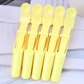 Lot de 5 pinces à cheveux jaunes avec poignée antidérapante pour la coiffure professionnelle - Jaune