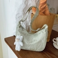 Light green textured half-moon hobo bag with a cute plush bear pendant and adjustable strap - Green with Pendant
