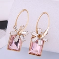 Detailed close-up of long gold earrings with pink rectangular gem and crystal flower - Pink Rectangular Gemstone Style (3#)