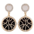 Gouden ronde hangende oorbellen met zwart geometrisch raster en witte kristalaccenten - Goud