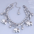 Detailed view of silver double-layer bracelet with elephant charms and small bells - Elephant Style (4#)