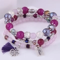 Dettaglio del bracciale a tre strati con perline, nappe viola e ciondolo a quadrifoglio - Stile 6-Viola Rosa