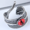 Detailed close-up of retro feather carving and a striking red eye stone on the silver ring - Red Blood Eye Feather Style (4)