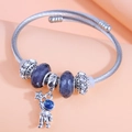 Bracelet à breloques astronaute avec perles facettées violettes et thème ciel étoilé - Astronaute