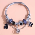 Bracelet à perles argenté avec ours noir, pendentif couronne et gemmes violettes - Ours en Peluche Noir