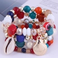 Set braccialetti boho multistrato con ciondoli a conchiglia e malocchio su bianco - Rosso Verde Arancione Multicolore (6)
