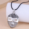 Detail of vintage tribal mask pendant in antique silver finish on black cord necklace - Mask Pendant (2082909)