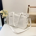 Weiße Ita-Tasche aus Leder mit großem PVC-Sichtfenster und seitlicher Schnürung - Gebrochenes Weiß