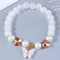 Elegant beaded bracelet featuring clear crackle beads and a white butterfly pendant - Yellow (42534)