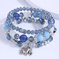 Mehrlagiges blaues Glasperlenarmband im Boho-Stil mit einem silbernen Elefanten-Anhänger - Blau