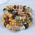 Bohemian multilayer beaded bracelet set with forest colors and a tree of life heart pendant - Colorful