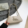 Bolso de hombro beige en cuero sintético con lazo elegante y textura de grano - Caqui
