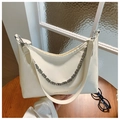Detail of cream PU leather crescent bag with silver G-chain and brand logo text - Basic Style / Off White