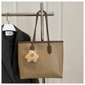 Detail of khaki tote bag with contrast stitching and a cute bear charm pendant - With Charm / Khaki