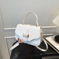 White lychee pattern crossbody bag with gold buckle and top handle in vintage style - White