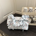 Light blue pleated cloud bag with red bow prints and ruffled drawstring handle - Blue