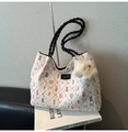 Detail of pleated tote bag with cartoon prints, black woven strap and star plush charm - With Charm / Black (with Pendant)