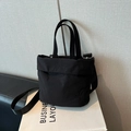 Borsa a secchiello minimalista in tessuto oxford nero con tracolla e manici superiori - Stile di base / Nero senza Ciondolo
