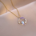 Elegant gold necklace with purple enamel wreath pendant and opal stone on champagne silk - Purple Enamel Wreath Style (X4010)