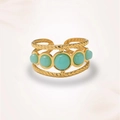Detailed macro view of an adjustable gold ring with mint green round stone inlays - Green Stone Style (J0443)