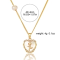 Detail showing gold heart necklace with rose shell inlay and 42+4cm size specifications - Heart Rose Pearl Necklace (X0204)