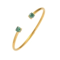 Elegant gold open bangle featuring two round green zircon stones in a minimalist chic style - Green Style (TT0412)