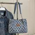 Blue and white plaid denim tote bag with leather tag and chain strap details - Blue