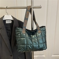 Quilted metallic tote bag in dark green with a bohemian patterned wide shoulder strap - Green