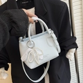 Mini light blue bucket bag in pebble faux leather with pearl bow and lace charm - Blue with Charm