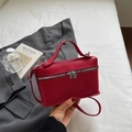 Chic red textured faux leather shoulder bag with silver zipper and vintage top handle - Red