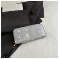 Detail of silver long zipper wallet with snake skin texture and gold metal hardware - Silver