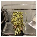 Chic bright yellow snakeskin textured crossbody bag with long tassels and silver buckle - Yellow