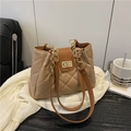 Quilted beige tote bag with brown handles, golden chain details and turn-lock closure - Khaki