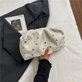 Chic cream dumpling bag with gold rivet studs made of soft leather for party looks - White