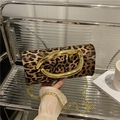 Chic leopard print clutch with bold gold oval buckle and chain strap for women - Leopard Print