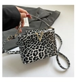 Leopard print box handbag with glossy finish and gold V-shaped metal buckle detail - Black 6174